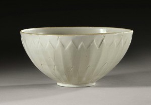 This undated photo provided by Sotheby’s Auction House in New York shows a 1,000-year-old Chinese “Ding” bowl from the Northern Song Dynasty. The bowl, purchased from a tag sale for no more than three dollars, was sold by Sotheby’s for more than $2.22 million during the opening session of Sotheby's fine Chinese ceramics and works of art auction Tuesday, March 19, 2013 in New York. (AP Photo/Sotheby’s Auction House) /NYR107/130319117458/AP PROVIDES ACCESS TO THIS PUBLICLY DISTRIBUTED HANDOUT PHOTO PROVIDED BY SOTHEBYS AUCTION HOUSE FOR EDITORIAL PURPOSES ONLY./1303200118